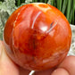 Carnelian in Orca Agate Quartz Sphere Healing Crystal Ball 81g 40mm