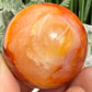 Carnelian in Orca Agate Quartz Sphere Healing Crystal Ball 81g 40mm