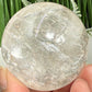 Clear Quartz with Hematoid Fire Quartz Sphere Crystal Ball 260g 57mm