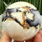 Volcanic Agate Quartz Sphere UV Reactive Crystal Ball 434g 70mm