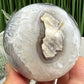Volcanic Agate Quartz Sphere UV Reactive Crystal Ball 425g 68mm