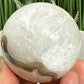 Volcanic Agate Quartz Sphere UV Reactive Crystal Ball 288g 59mm