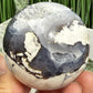 Volcanic Agate Quartz Sphere UV Reactive Crystal Ball 226g 56mm