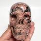 Rhodonite Skull Healing Crystal Carving 957g